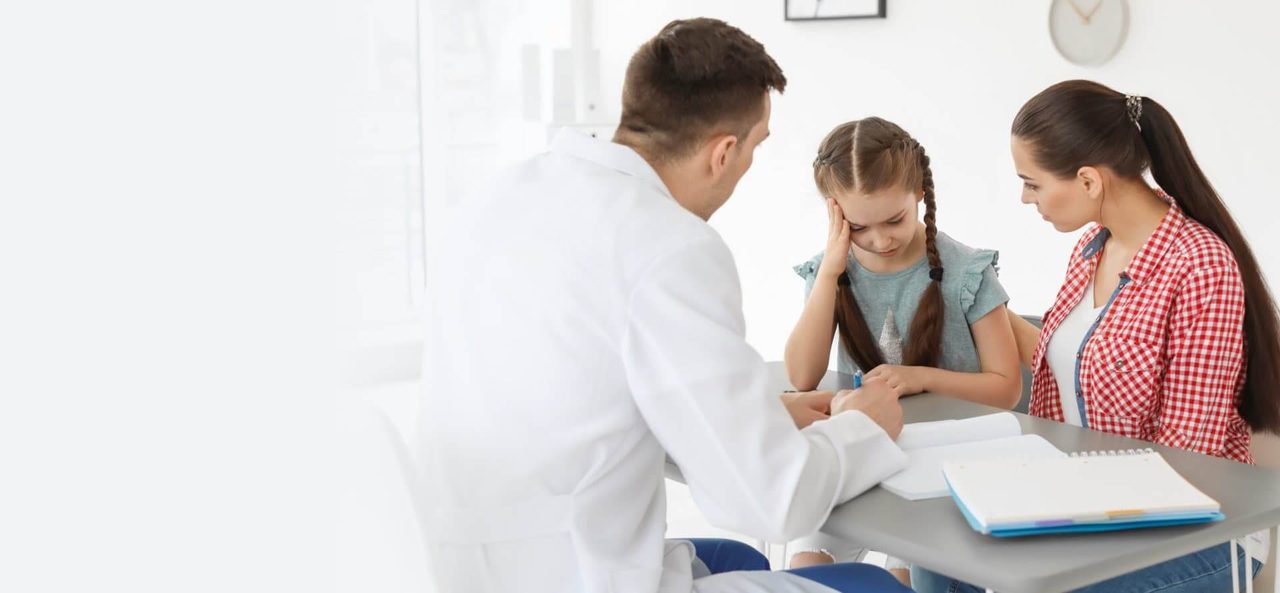 A parent and child at an appointment